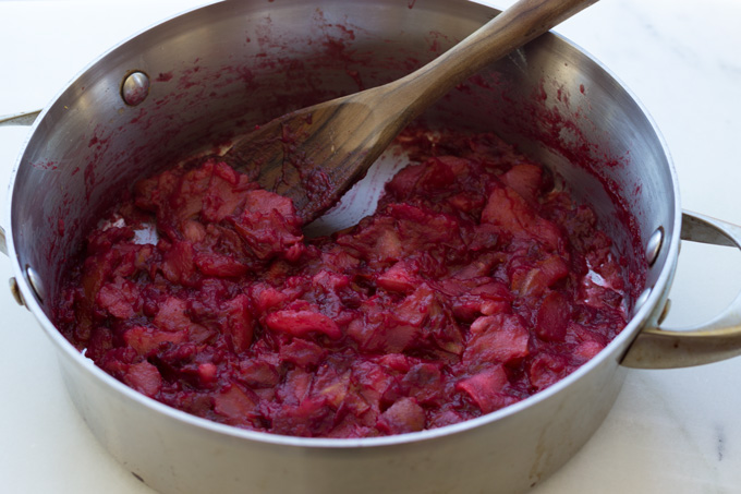Mixing of Paleo Apple Tart with Pear Cranberry Compote Filling