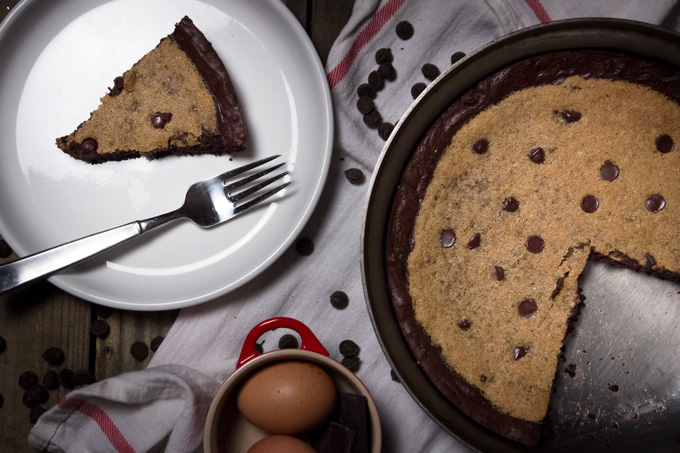 Sliced Paleo Skillet Brookie in a Plate with Fork