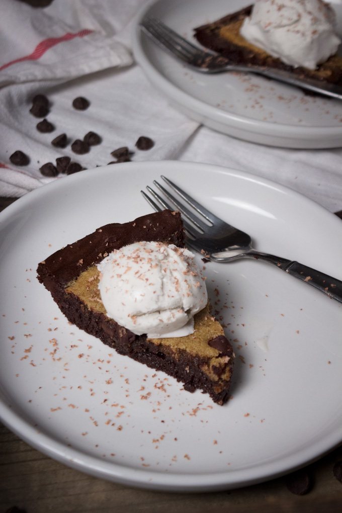 Close up view of Sliced Paleo Skillet Brookie in a Plate with Fork